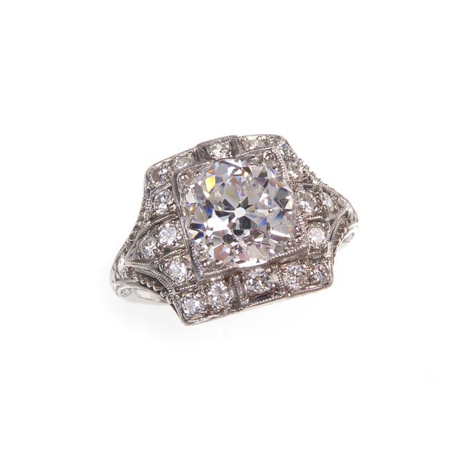 Early Art Deco round brilliant cut diamond and square panel cluster ring, c.1920, set with an old European cut diamond | MasterArt
